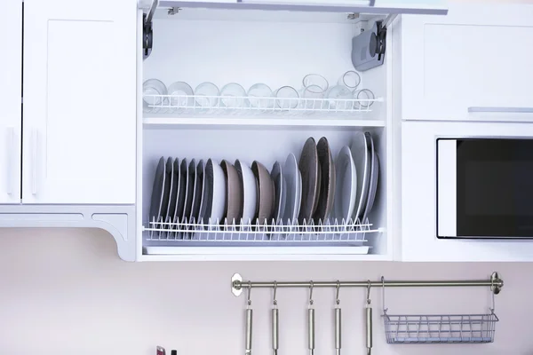 Clean dishware in kitchen — Stock Photo, Image