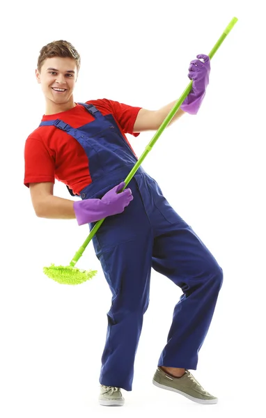 Young janitor with floor brush — Stock Photo, Image