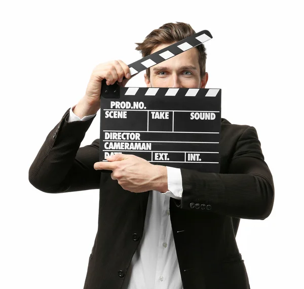 Man in a suit holding a movie clapperboard — Stock Photo, Image