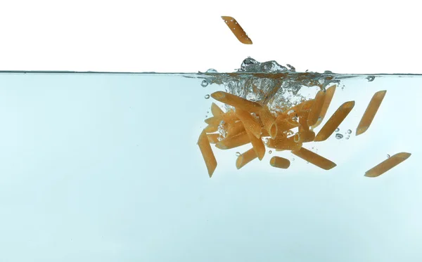 Penne pasta in water — Stock Photo, Image