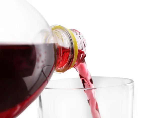 Pouring cherry soda into glass — Stock Photo, Image