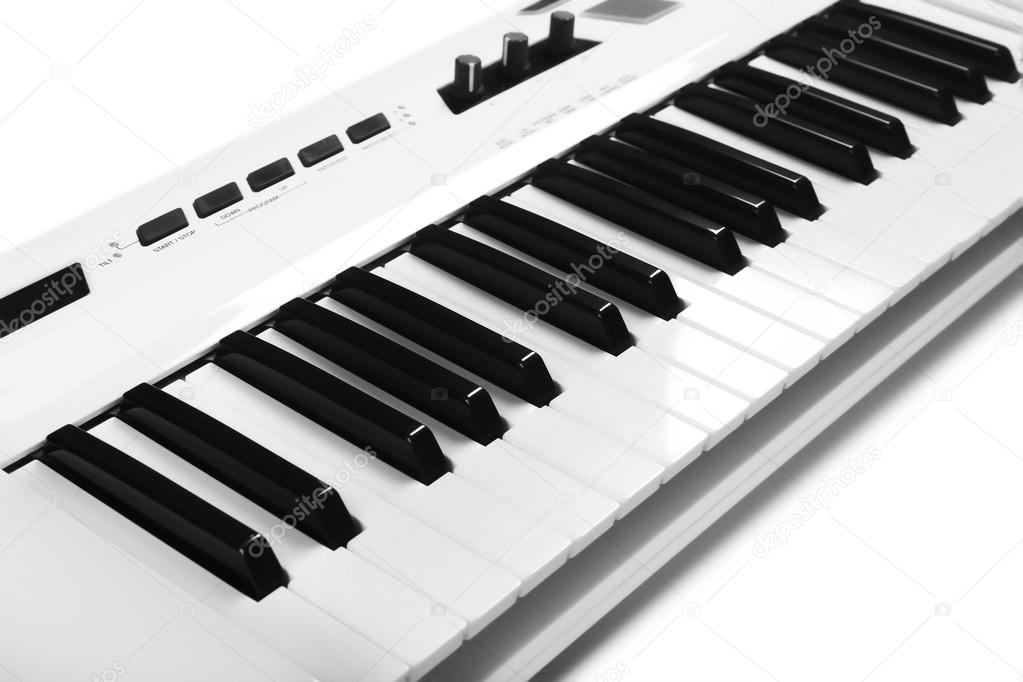 Keyboard of synthesizer closeup Stock Photo by ©belchonock 108215330