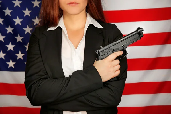 Woman holding gun — Stock Photo, Image