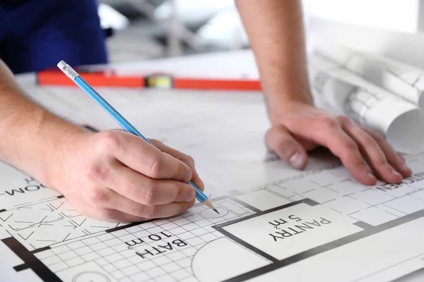 Architect sketching construction project — Stock Photo, Image