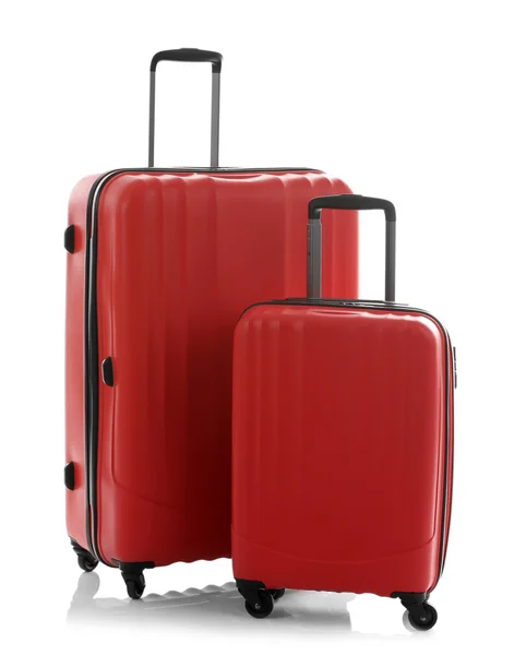 Different suitcases standing on floor — Stock Photo, Image