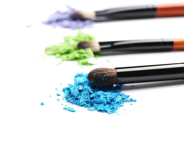 Makeup brushes with cosmetic powder — Stock Photo, Image