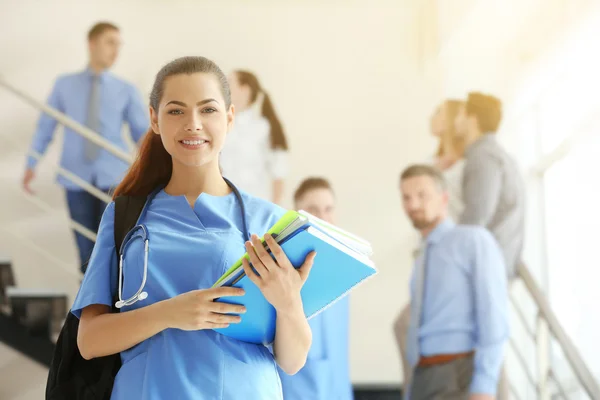 Smiling Young Female Student Backpack Books Indoors — Stock Photo, Image