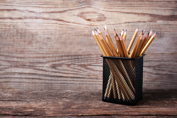 pencils in metal holder 