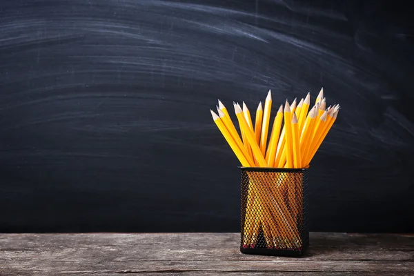 Pencils in metal holder — Stock Photo, Image