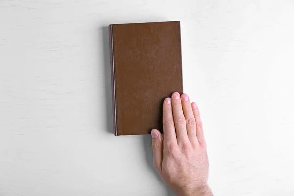 Male hand hold book — Stock Photo, Image