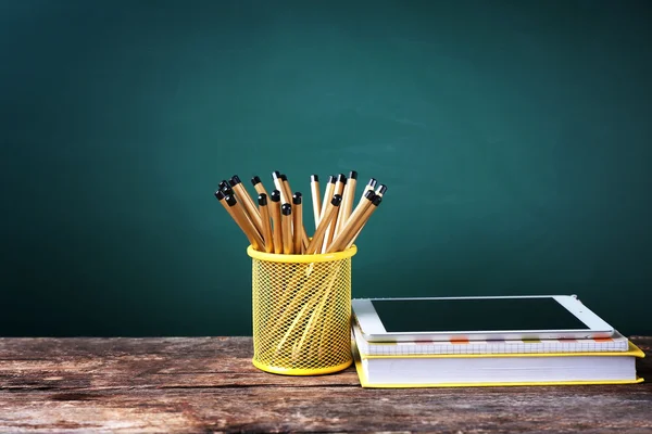 Pencils in metal holder — Stock Photo, Image