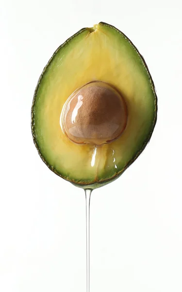 Verse avocado met olie — Stockfoto
