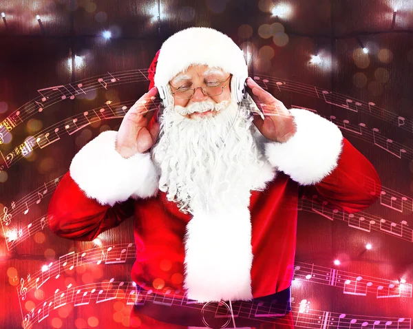 Weihnachtsmann mit Kopfhörer — Stockfoto