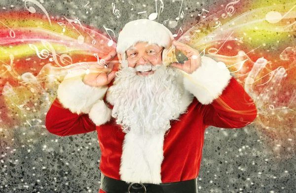 Weihnachtsmann mit Kopfhörer — Stockfoto