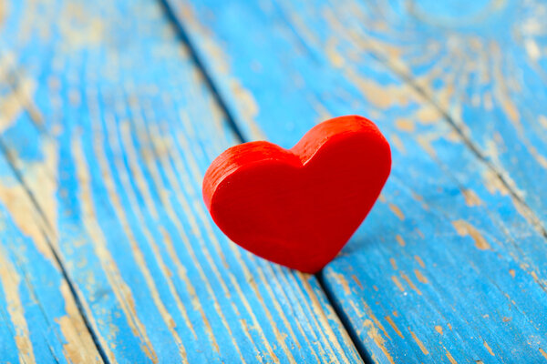 Wooden hearts on wooden background