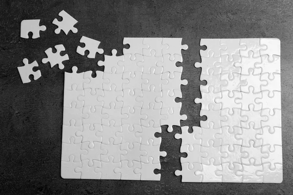 Bağlantısız beyaz jigsaw puzzle — Stok fotoğraf