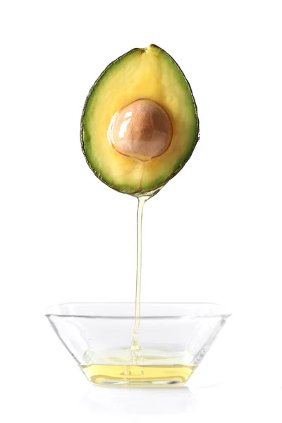 Avocado und Öl gießen — Stockfoto