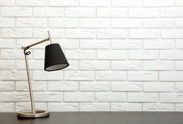 Modern lamp on the desk — Stock Photo, Image