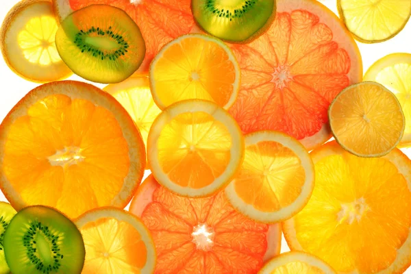 Fresh sliced citrus background — Stock Photo, Image