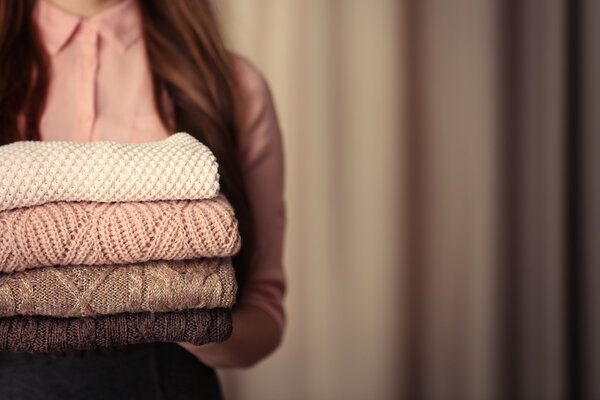 Stack of knitted clothes  