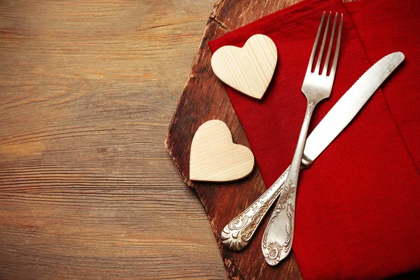 Composition of fork, knife, napkin — Stock Photo, Image