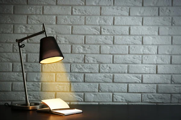 Modern lamp on the desk — Stock Photo, Image