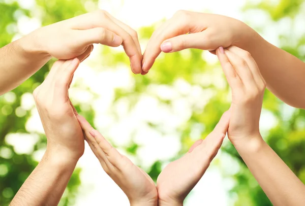 Hands in shape of heart — Stock Photo, Image