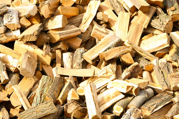 Firewood background - chopped firewood