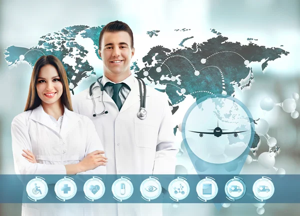 Two doctors and virtual screen. Medical tourism concept