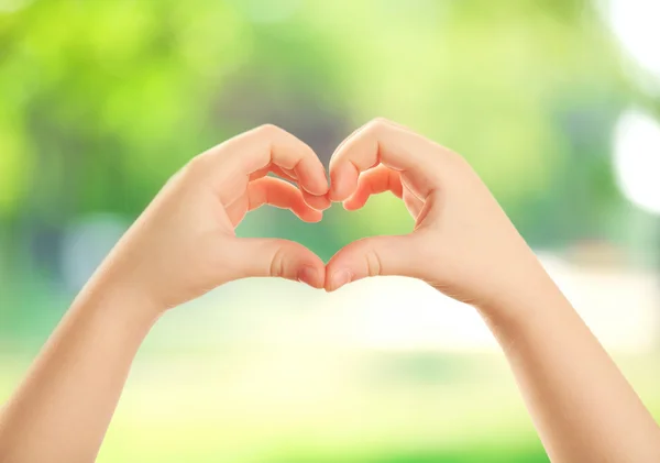 Child hands in heart shape — Stock Photo, Image