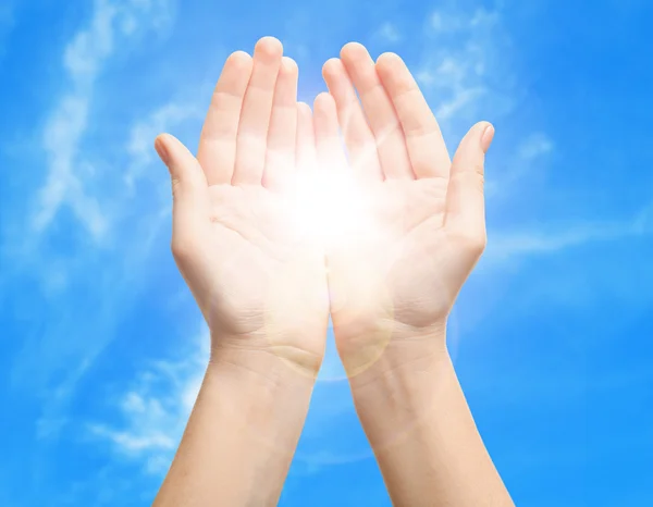 Female hands with sun — Stock Photo, Image