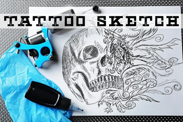 Tattoo machine, schets en tattoo benodigdheden — Stockfoto