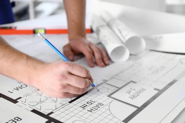 Architect sketching construction project — Stock Photo, Image