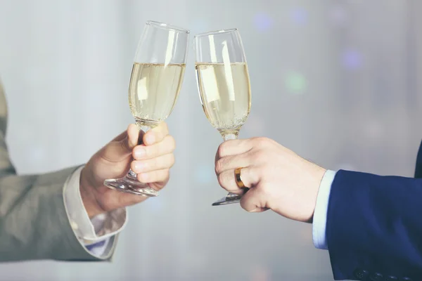 Two homosexuals drink champagne — Stock Photo, Image