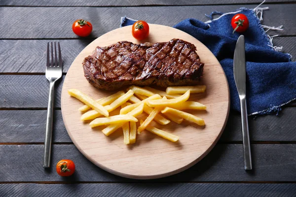 Grilled steak with french fries — Stock Photo, Image