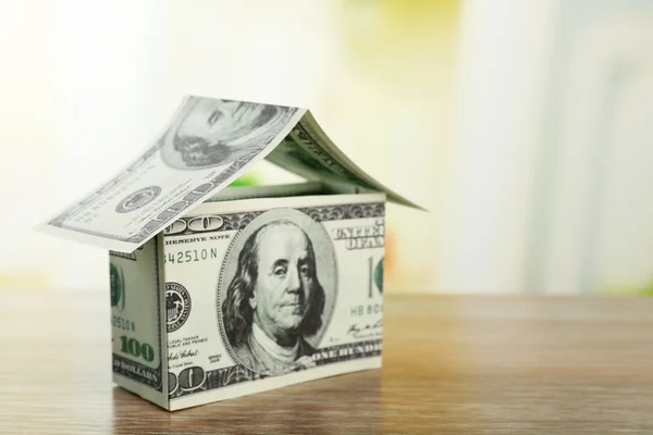 Money house on wooden table — Stock Photo, Image