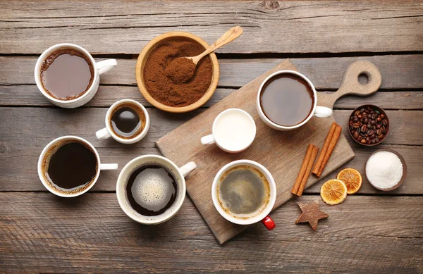 Cups of coffee with spices — Stock Photo, Image