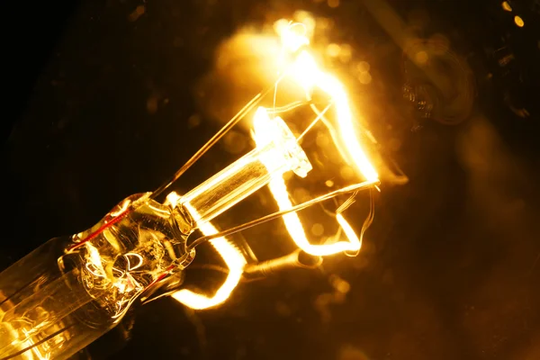 Illuminated light bulb — Stock Photo, Image