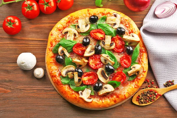 Delicious tasty pizza with ingredients — Stock Photo, Image