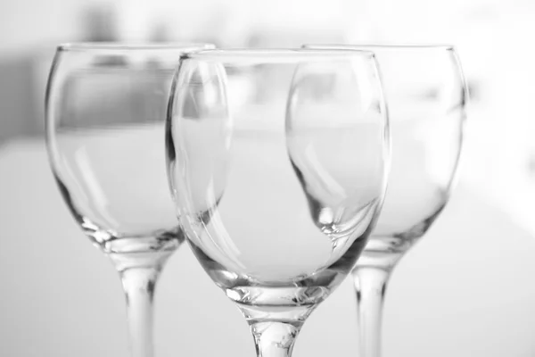 Wineglasses on blurred interior — Stock Photo, Image