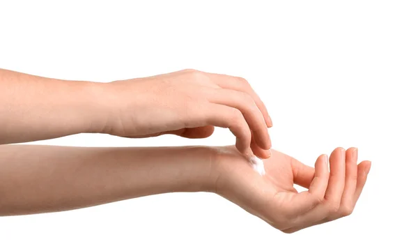 Beautiful female hands applying cream — Stock Photo, Image