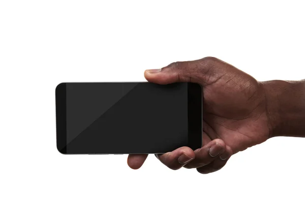 Tenere in mano uno smartphone — Foto Stock