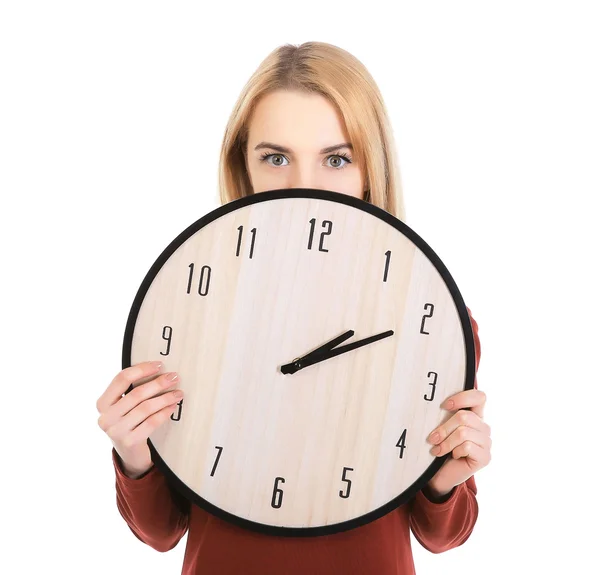 Beautiful young girl holding clock Royalty Free Stock Images