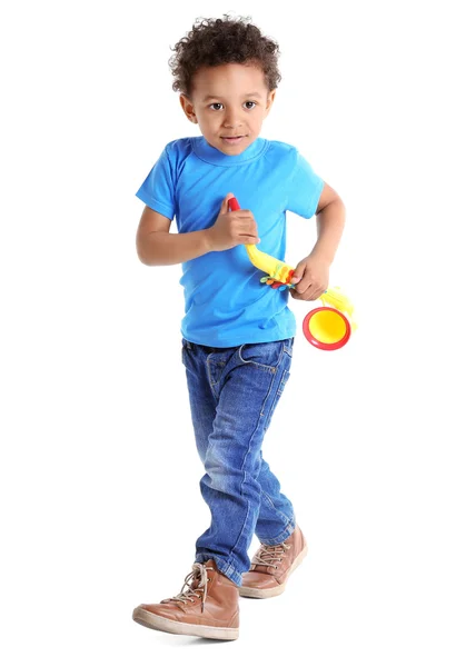 Menino brincando com brinquedo musical — Fotografia de Stock
