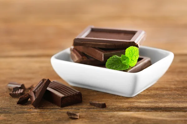 Chocolate with mint in a white bowl — Stock Photo, Image