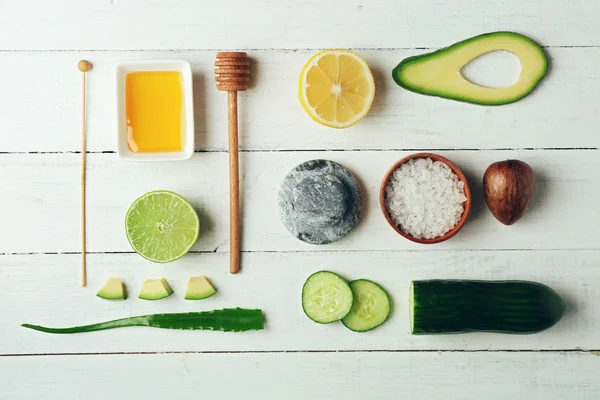 Still life with avocado on wooden table — Stock Photo, Image