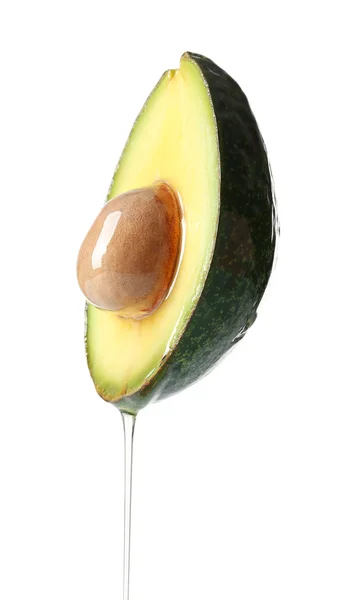 Fresh avocado with oil — Stock Photo, Image