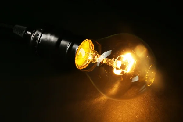 Illuminated light bulb — Stock Photo, Image