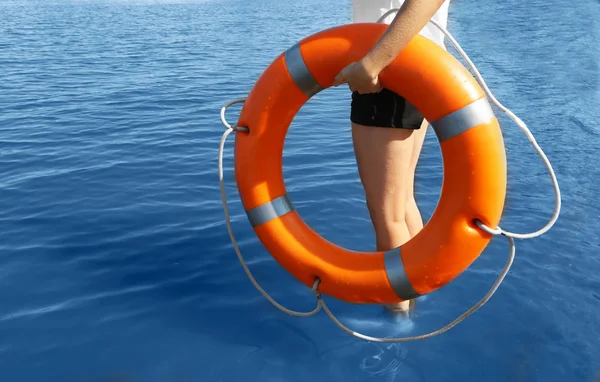 Girl with life buoy — Stock Photo, Image