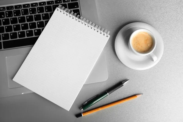 Empty  notebook on laptop keyboard — Stock Photo, Image